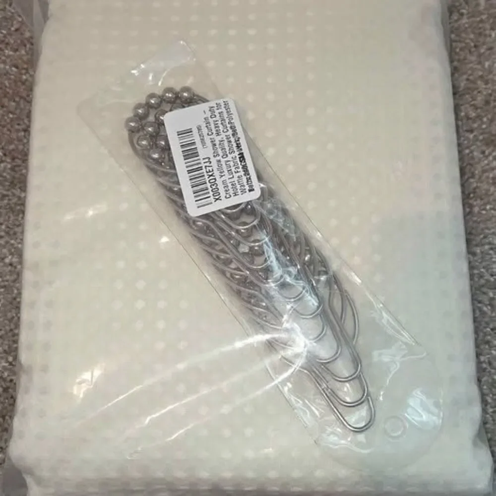 Waffle shower curtain with 12 metal hooks